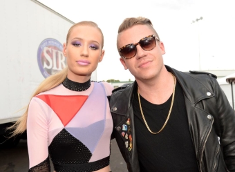 Rappers Iggy Azalea and Macklemore attend the 2014 iHeartRadio Music Festival Village on September 20, 2014 in Las Vegas, Nevada. Photo Credit: Kevin Mazur/WireImage