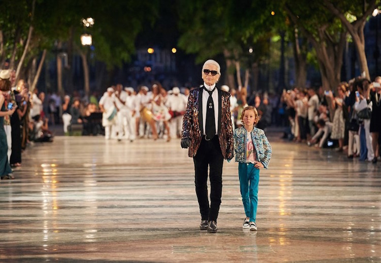 Karl Lagerfeld wearing a Hedi Slimane jacket at Chanel’s Cruise 2017 show in Cuba. Credit: Chanel. 