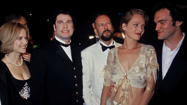 Kelly Preston, John Travolta, Bruce Willis and Uma Thurman with Quentin Tarantino who has awarded wiyh the gold palm for his movie "Pulp Fiction" at the47th International Cannes Film Festival. Cannes, FRANCE - 21/05/1994/0702281641
